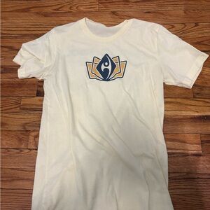 Women’s light yellow Graphic T-Shirt with Navy & Gold Emblem
